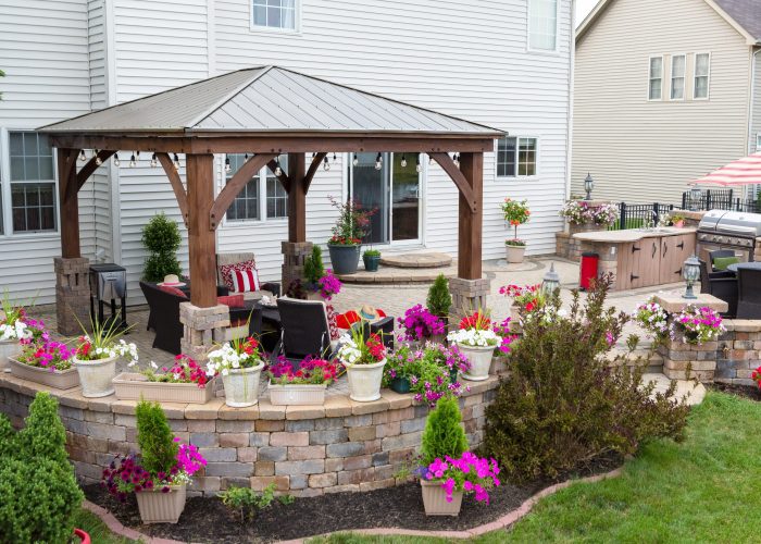 Colorful exterior curved patio with summer flowers